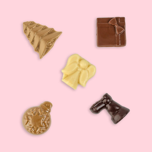 Hill St. Christmas chocolate shapes: a caramel tree, milk present, white angel, caramel bauble and dark boot